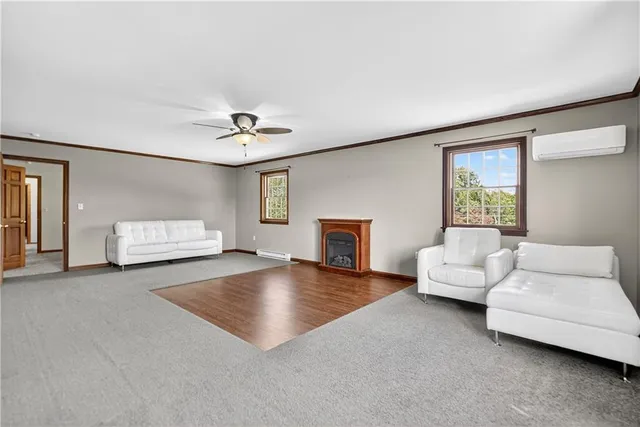 a view of livingroom with furniture and window