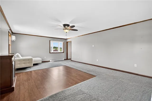 a view of a hallway with white walls