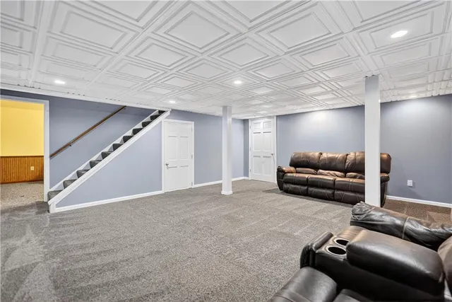 a living room with furniture and a couch