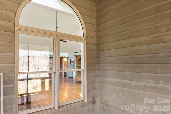 a bathroom with a glass door shower