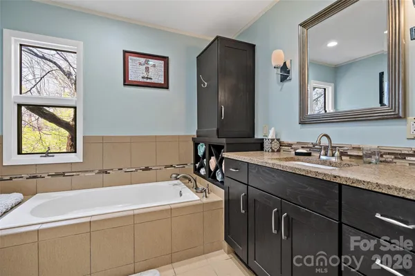 a bathroom with a sink and a vanity