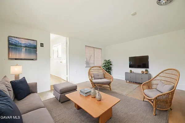a view of a room with rack on the wall