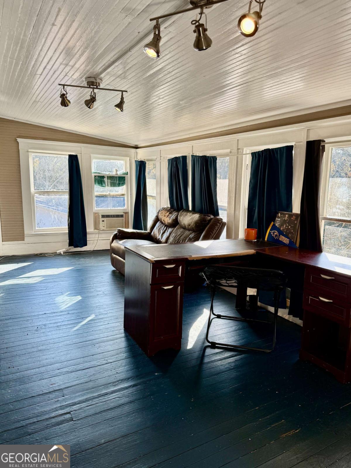 231 Bowers Street Royston, GA 30662 - Photo 21 of 28 a living room with furniture and wooden floor