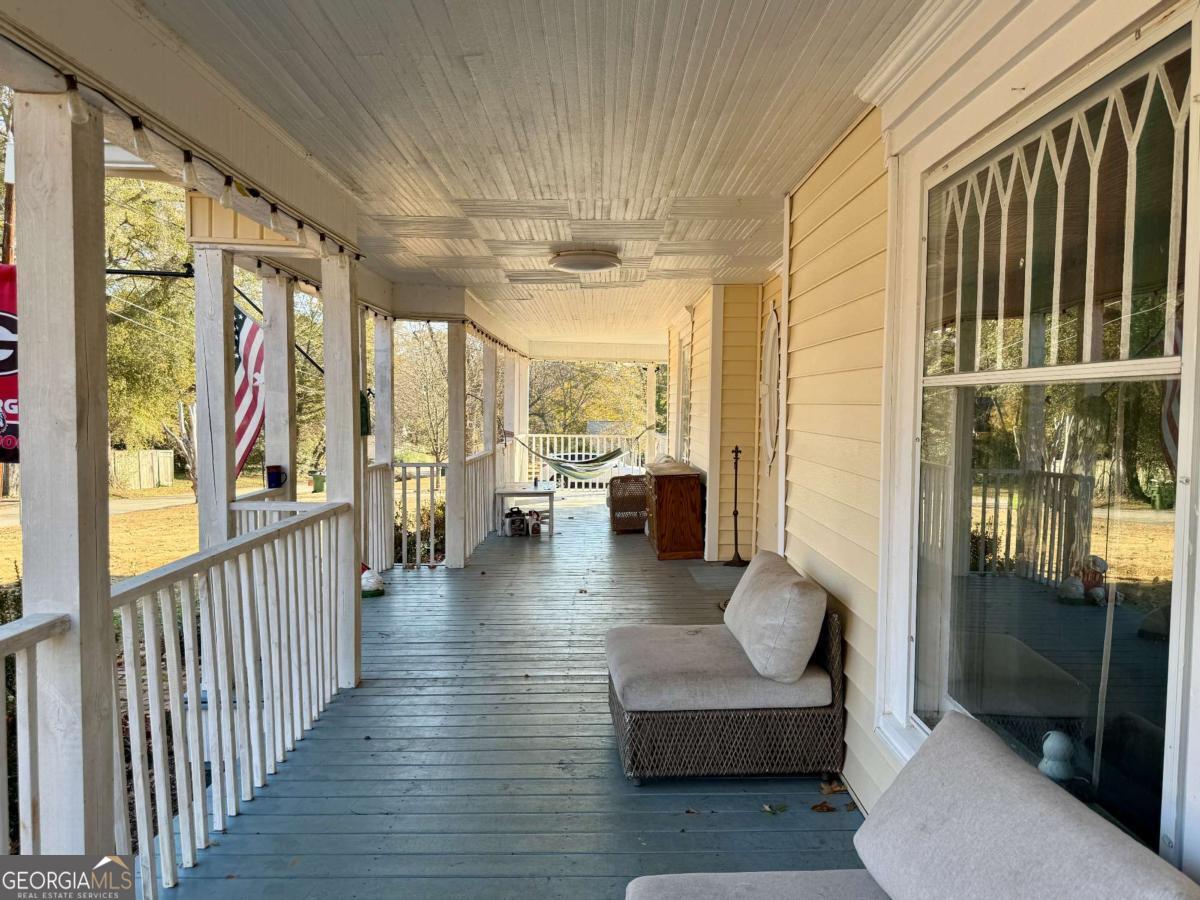 231 Bowers Street Royston, GA 30662 - Photo 25 of 28 a living room with furniture and a large window