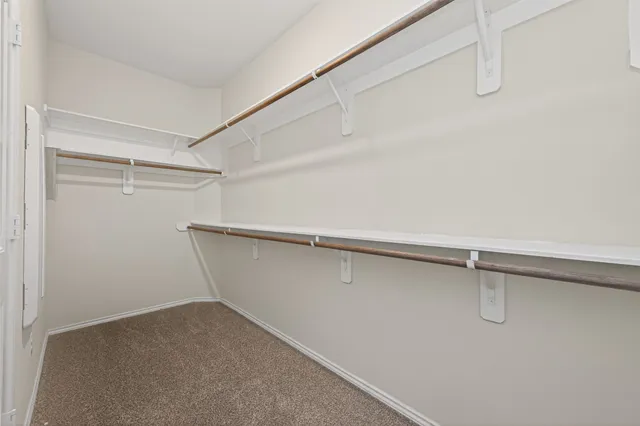 a view of a room with racks on the wall