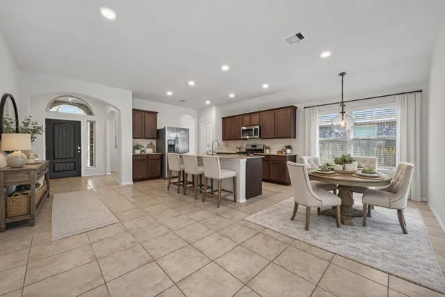 a view of a dining room with furniture
