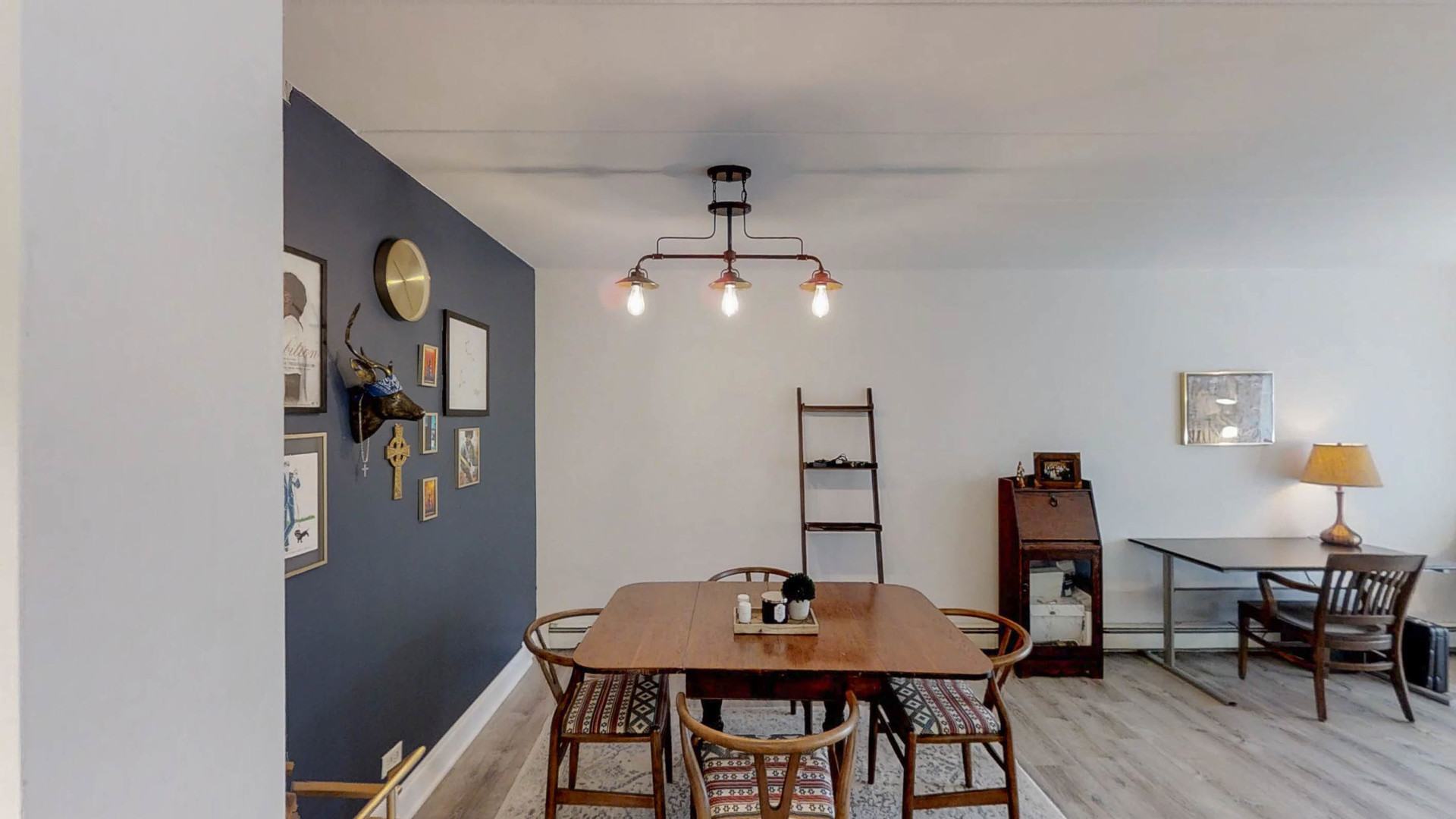 1041 North Mill Street, Unit 203 Naperville, IL 60563 - Photo 14 of 18 a view of a dining room with furniture and wooden floor