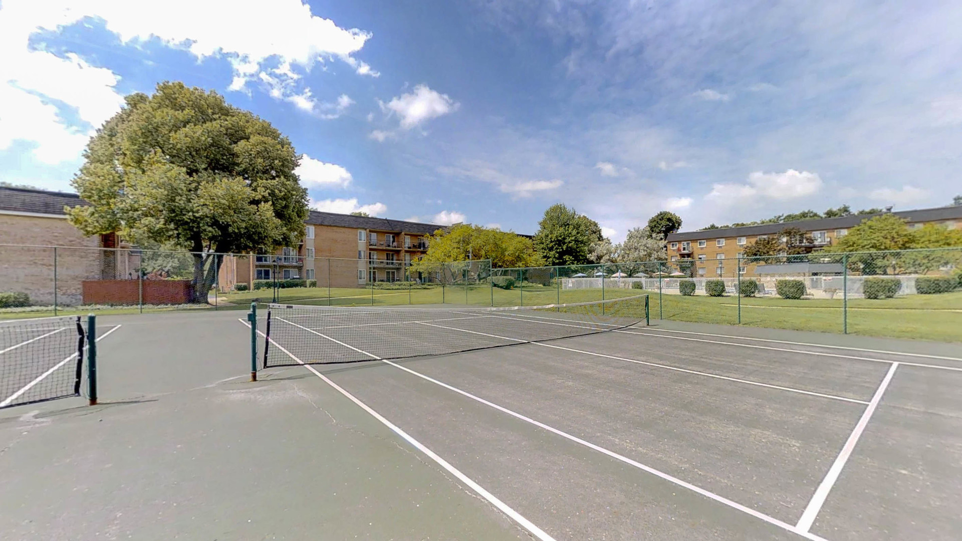 1041 North Mill Street, Unit 203 Naperville, IL 60563 - Photo 18 of 18 a view of a tennis court