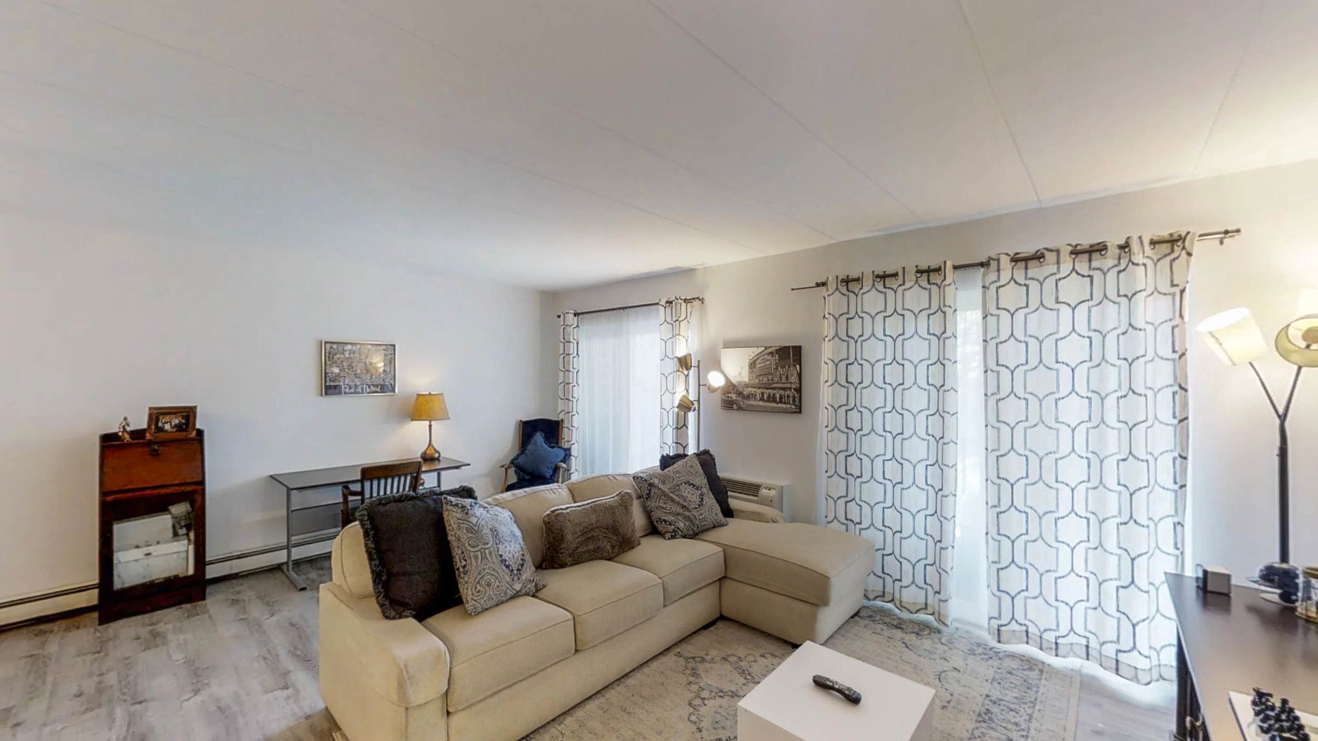 1041 North Mill Street, Unit 203 Naperville, IL 60563 - Photo 2 of 18 a living room with furniture and a window