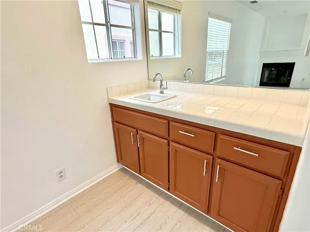 a fireplace with a hallway