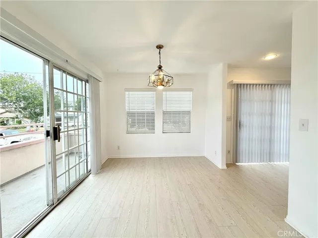 a view of a hallway with windows