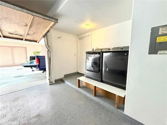 a view of a door and a window