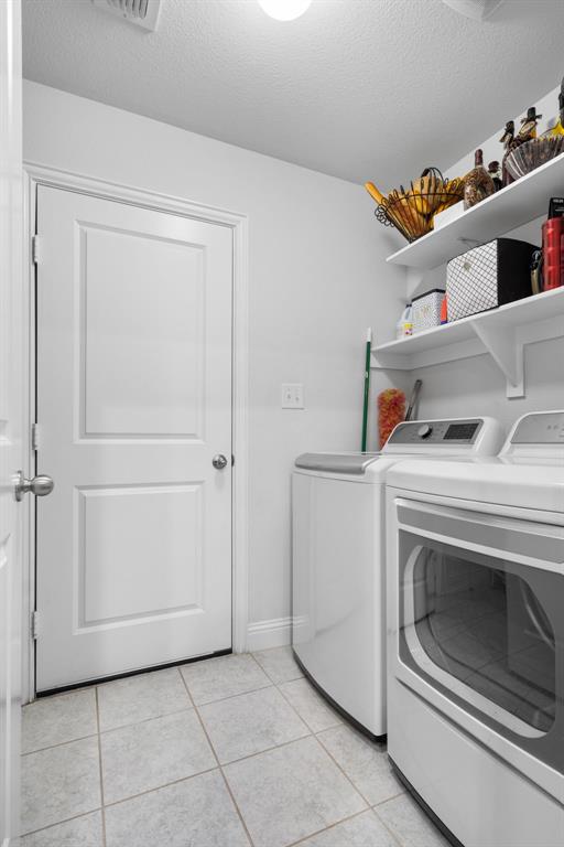 3724 Ranchers Ridge Krum, TX 76249 - Photo 23 of 32 a utility room with dryer and washer