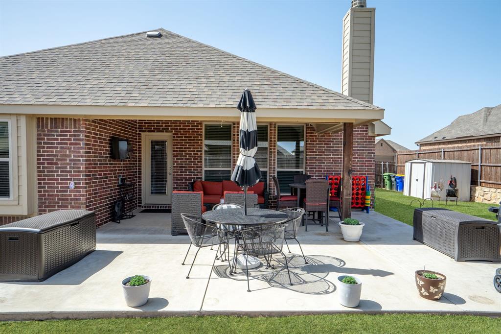 3724 Ranchers Ridge Krum, TX 76249 - Photo 24 of 32 a view of a house with patio
