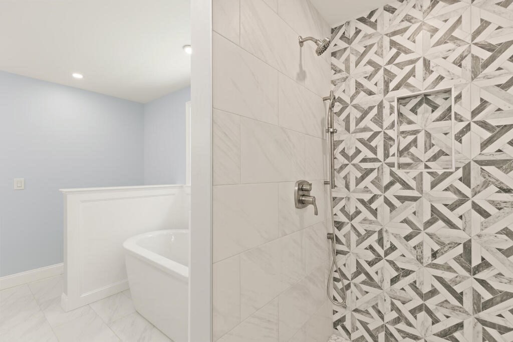 15 Lawler Lane Stoughton, MA 02072 - Photo 31 of 41 a bathroom with a bathtub and shower