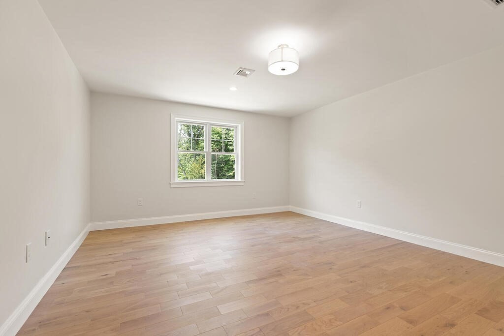 15 Lawler Lane Stoughton, MA 02072 - Photo 35 of 41 an empty room with a window