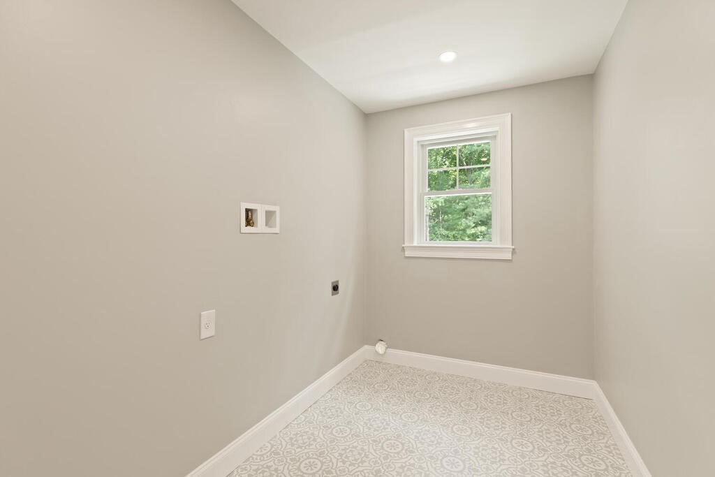 15 Lawler Lane Stoughton, MA 02072 - Photo 36 of 41 a view of an empty room with a window