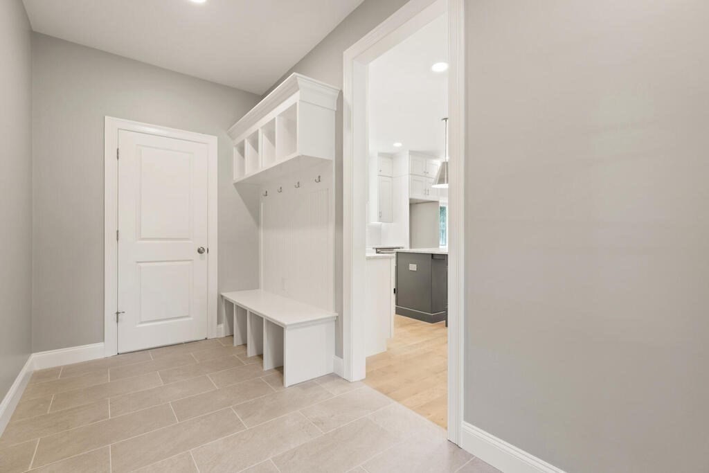 15 Lawler Lane Stoughton, MA 02072 - Photo 38 of 41 a view of a bathroom with a walk in closet and a bathroom