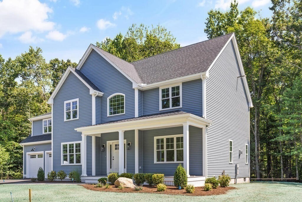 15 Lawler Lane Stoughton, MA 02072 - Photo 41 of 41 a front view of a house with a yard