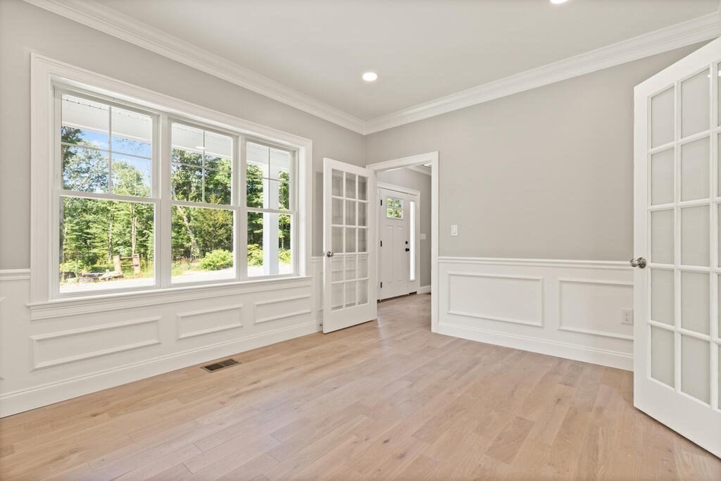 15 Lawler Lane Stoughton, MA 02072 - Photo 8 of 41 a view of an empty room with a window