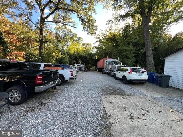 a view of a cars parked in a parking space