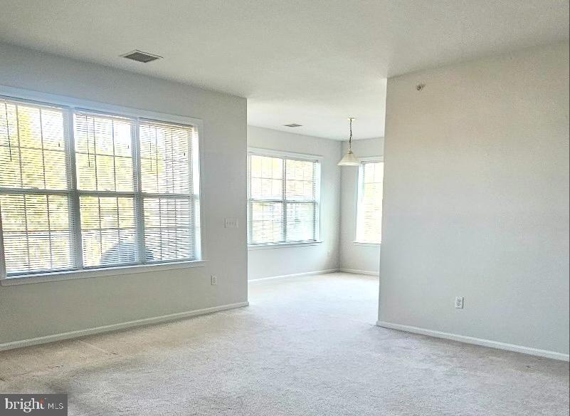 931 Timberlake Drive Ewing, NJ 08618 - Photo 4 of 16 a view of an empty room with a window