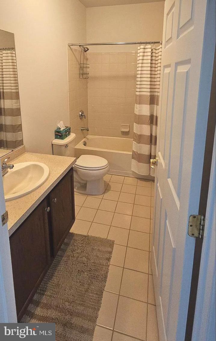 931 Timberlake Drive Ewing, NJ 08618 - Photo 9 of 16 a bathroom with a sink a toilet and shower