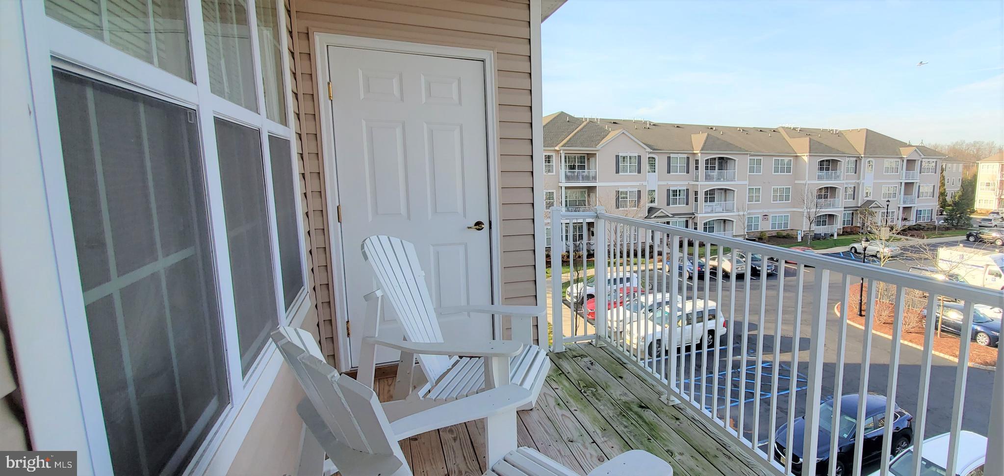 931 Timberlake Drive Ewing, NJ 08618 - Photo 10 of 16 a view of balcony with a potted plant