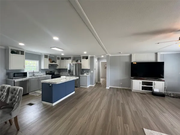 a living room with furniture and a couch