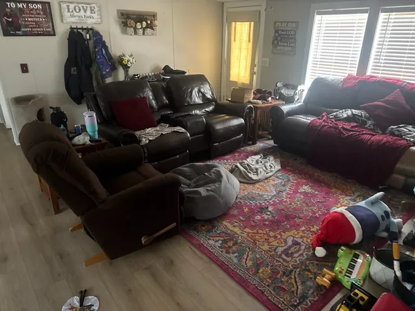 a view of a swimming pool with a yard