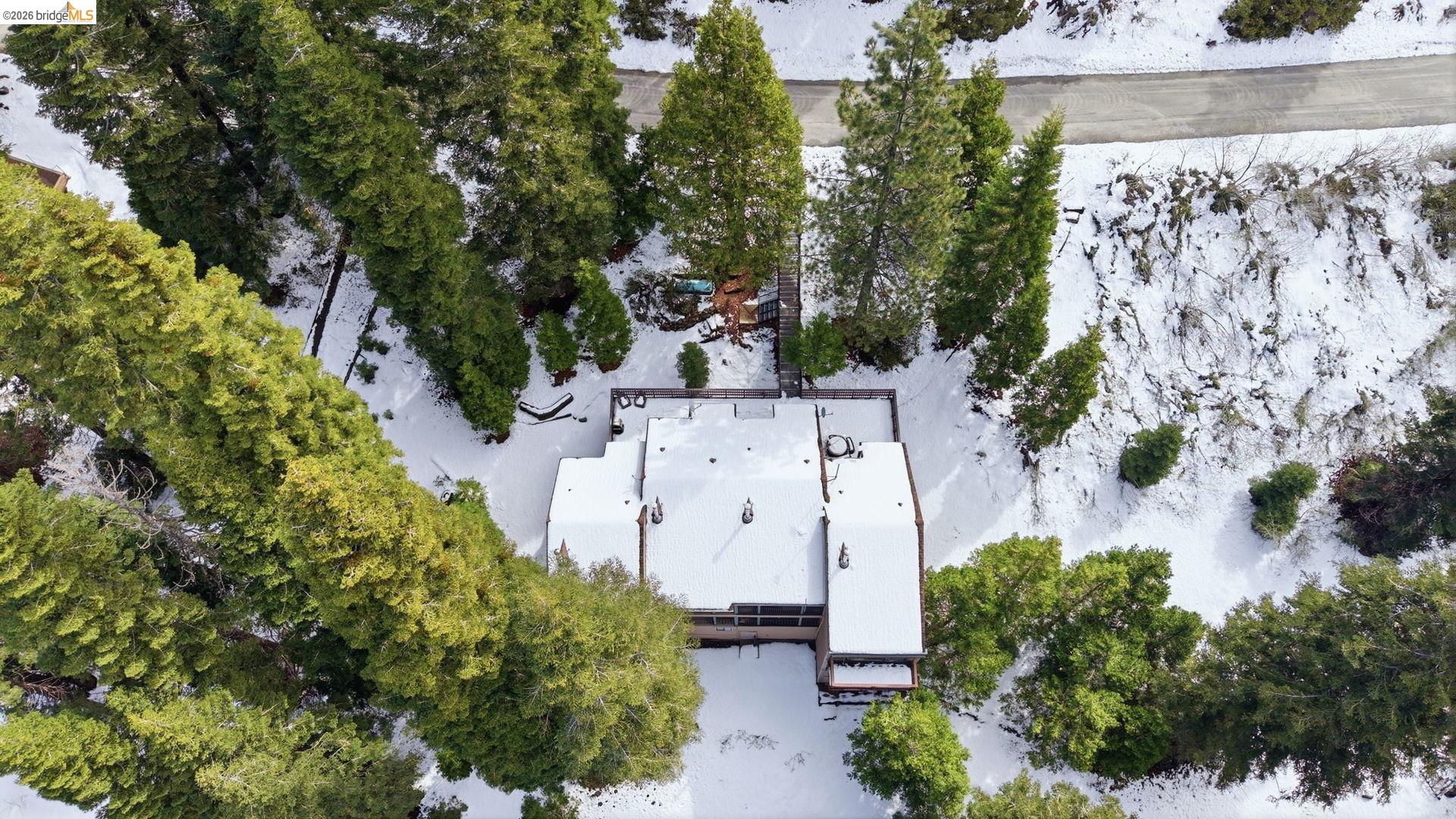 33840 Upper Leland Road, Unit 25A Pinecrest, CA 95364 - Photo 32 of 41 an aerial view of a house with a yard