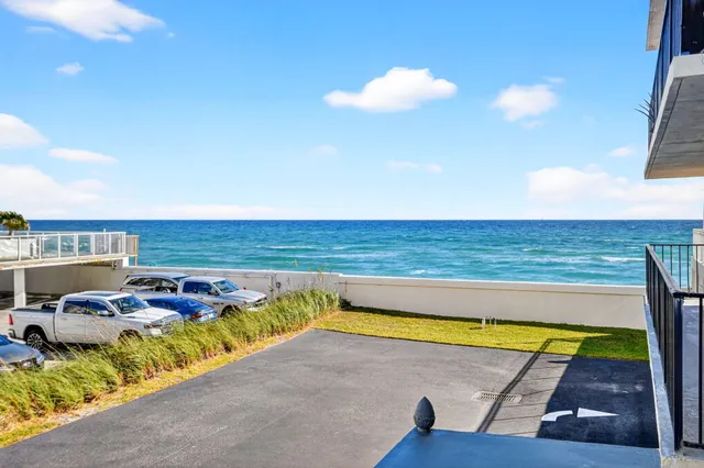 a view of swimming pool with seating area