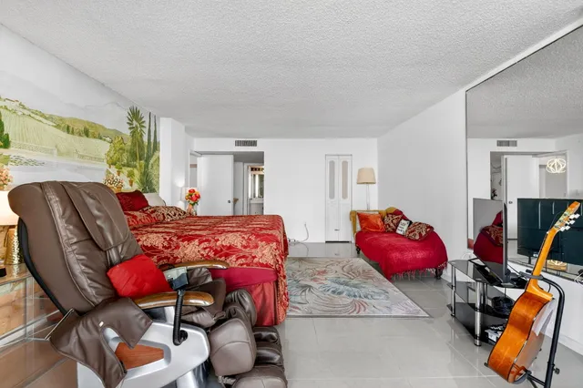a dining room with table and chairs