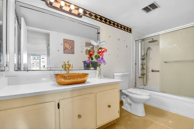 a bathroom with a shower and a bathtub