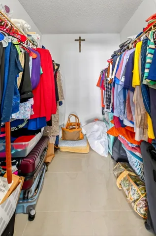 a view of a balcony with furniture