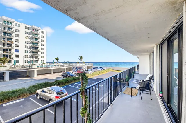 a view of a balcony with city view