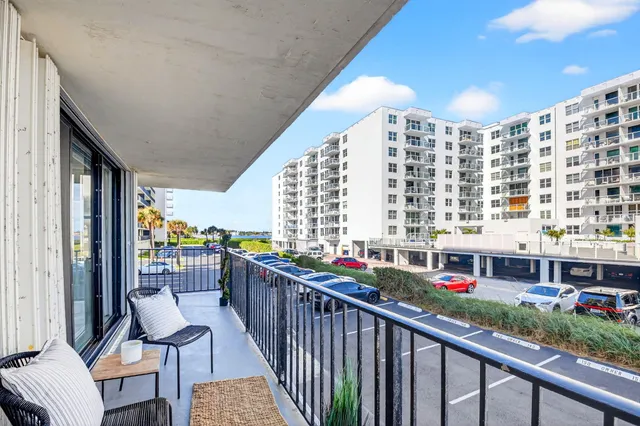 a view of a balcony with city view