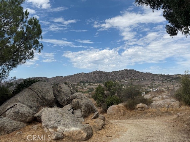 24260 Minton Road Homeland, CA 92548 - Photo 23 of 23 a view of a mountain in the distance