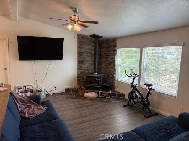 24260 Minton Road Homeland, CA 92548 - Photo 6 of 23 a living room with furniture a flat screen tv and a large window