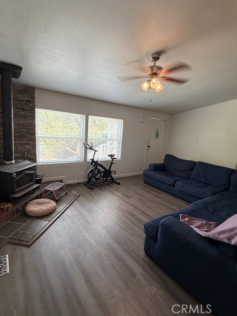 24260 Minton Road Homeland, CA 92548 - Photo 9 of 23 a living room with furniture a window and a flat screen tv