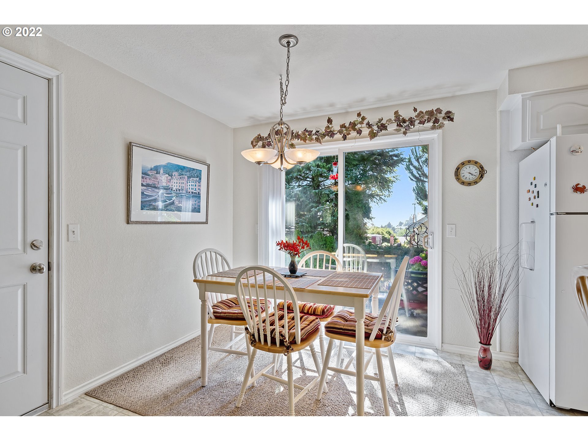 4225 Orchard Loop Netarts, OR 97141 - Photo 13 of 31 a dining room with furniture and window