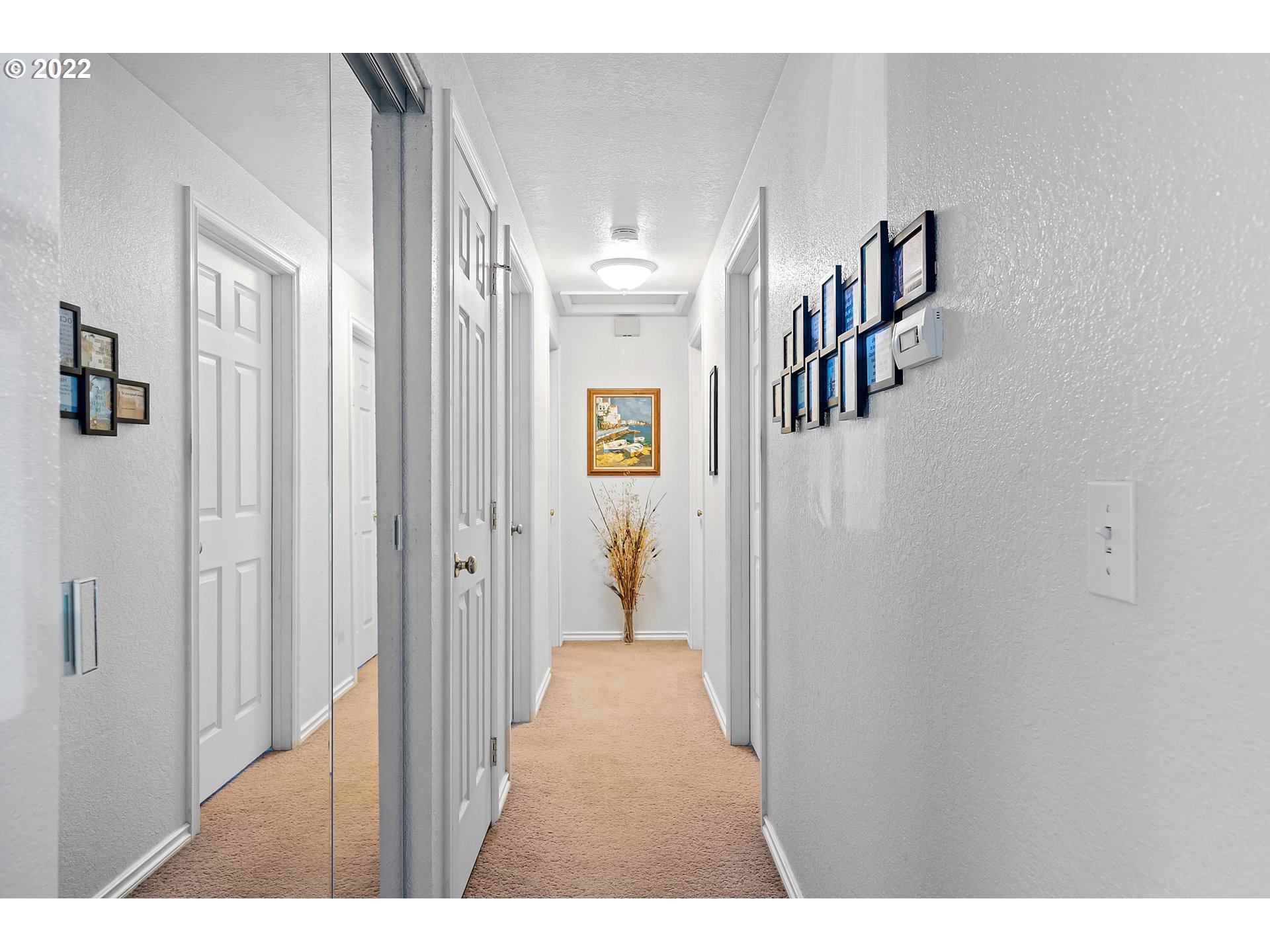 4225 Orchard Loop Netarts, OR 97141 - Photo 14 of 31 a view of a hallway with windows