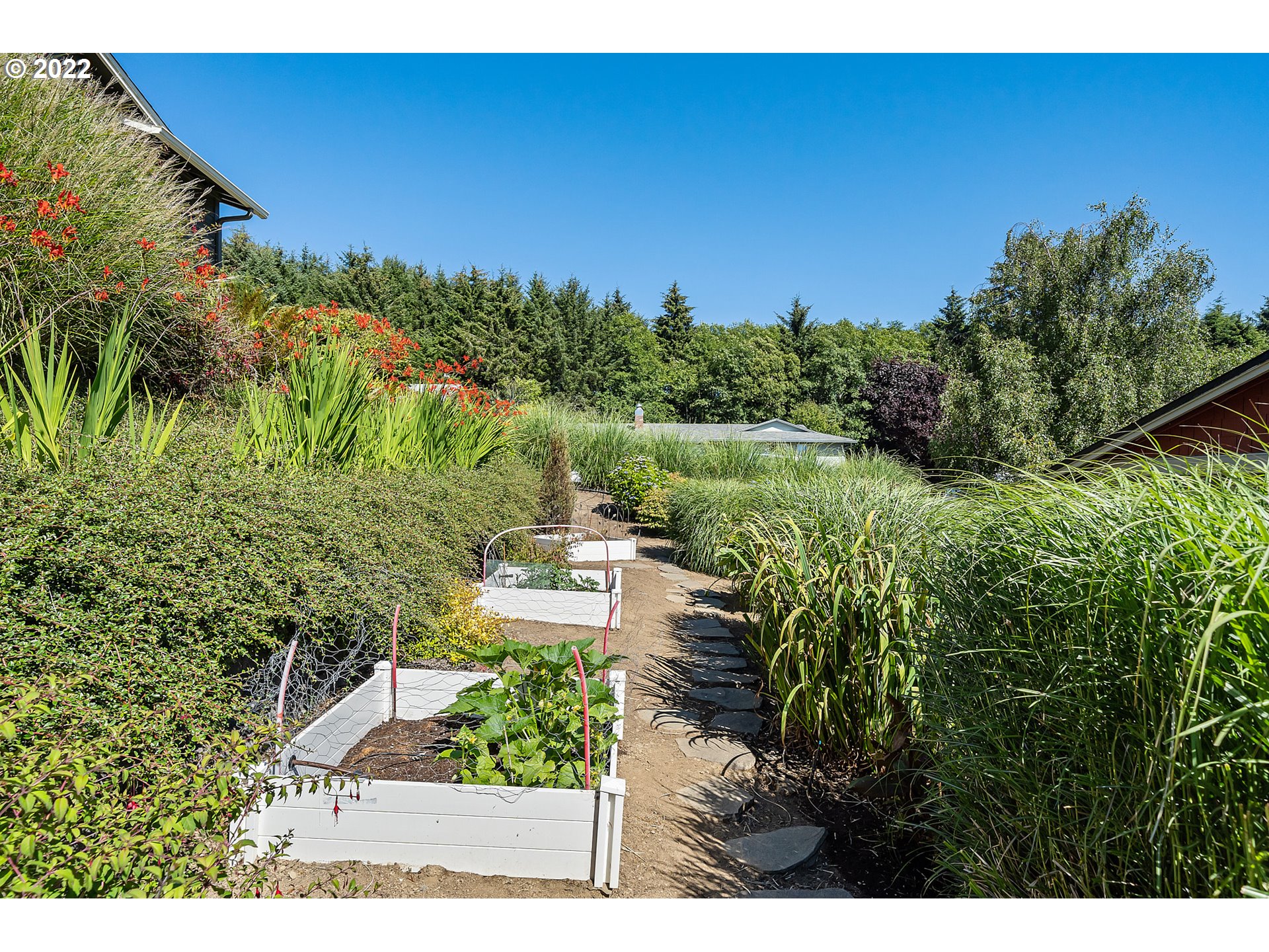 4225 Orchard Loop Netarts, OR 97141 - Photo 23 of 31 a view of a house with a yard
