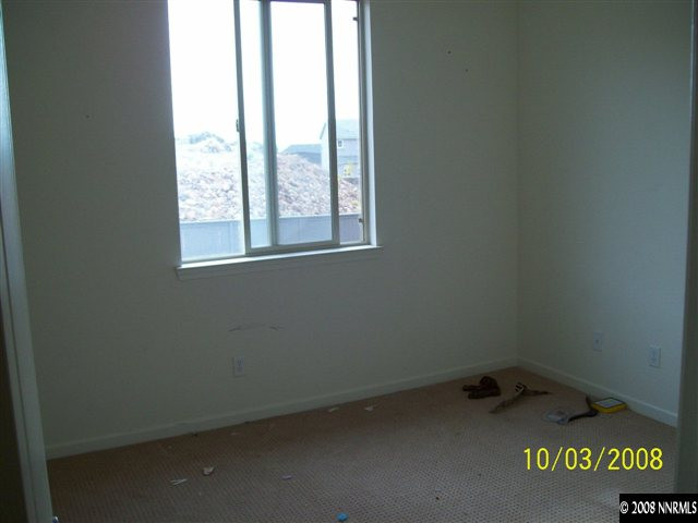 960 North University Park Loop Reno, NV 89512 - Photo 6 of 9 an empty room with a window