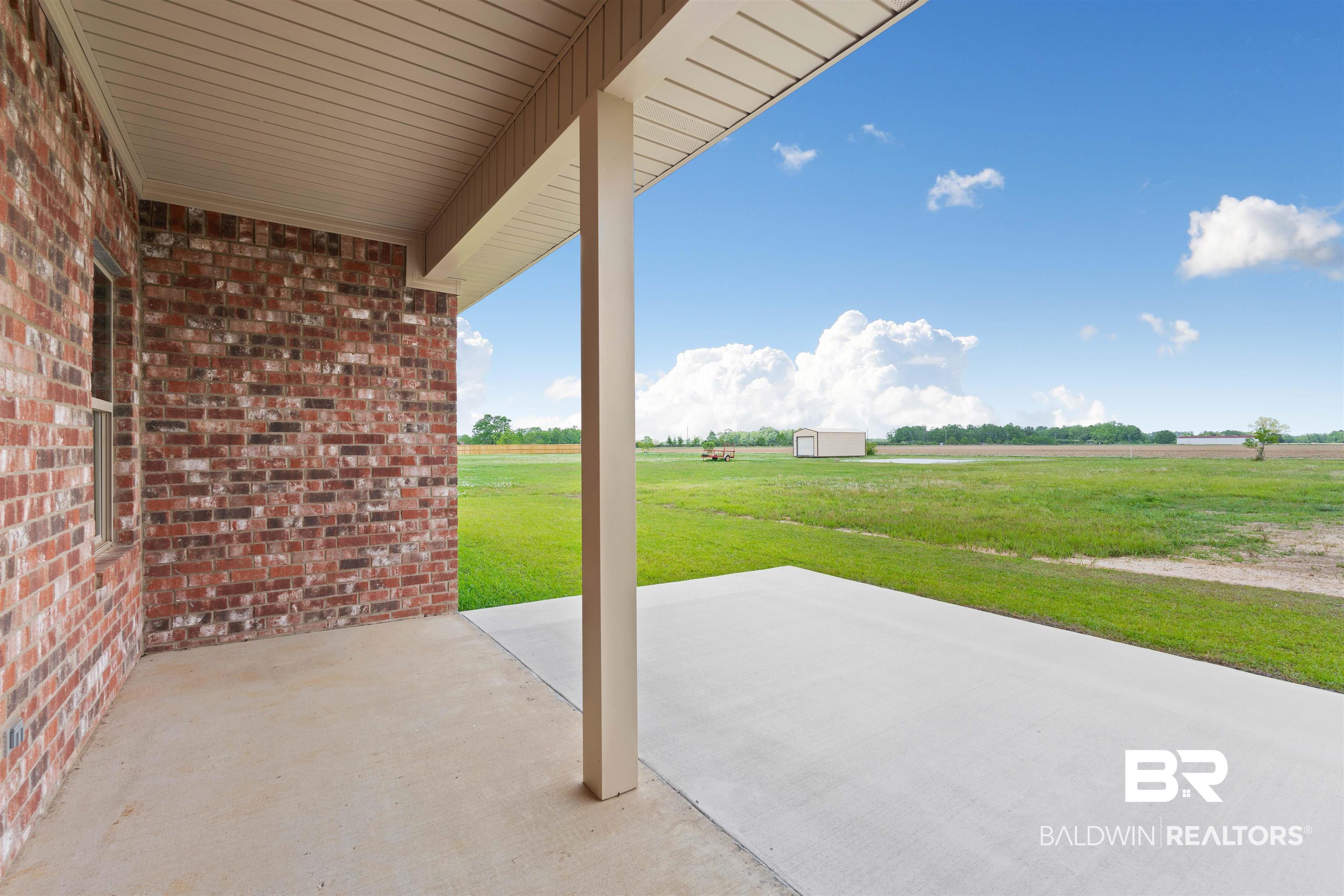 10164 Bridgewater Drive Theodore, AL 36582 - Photo 32 of 34 Covered Back Porch