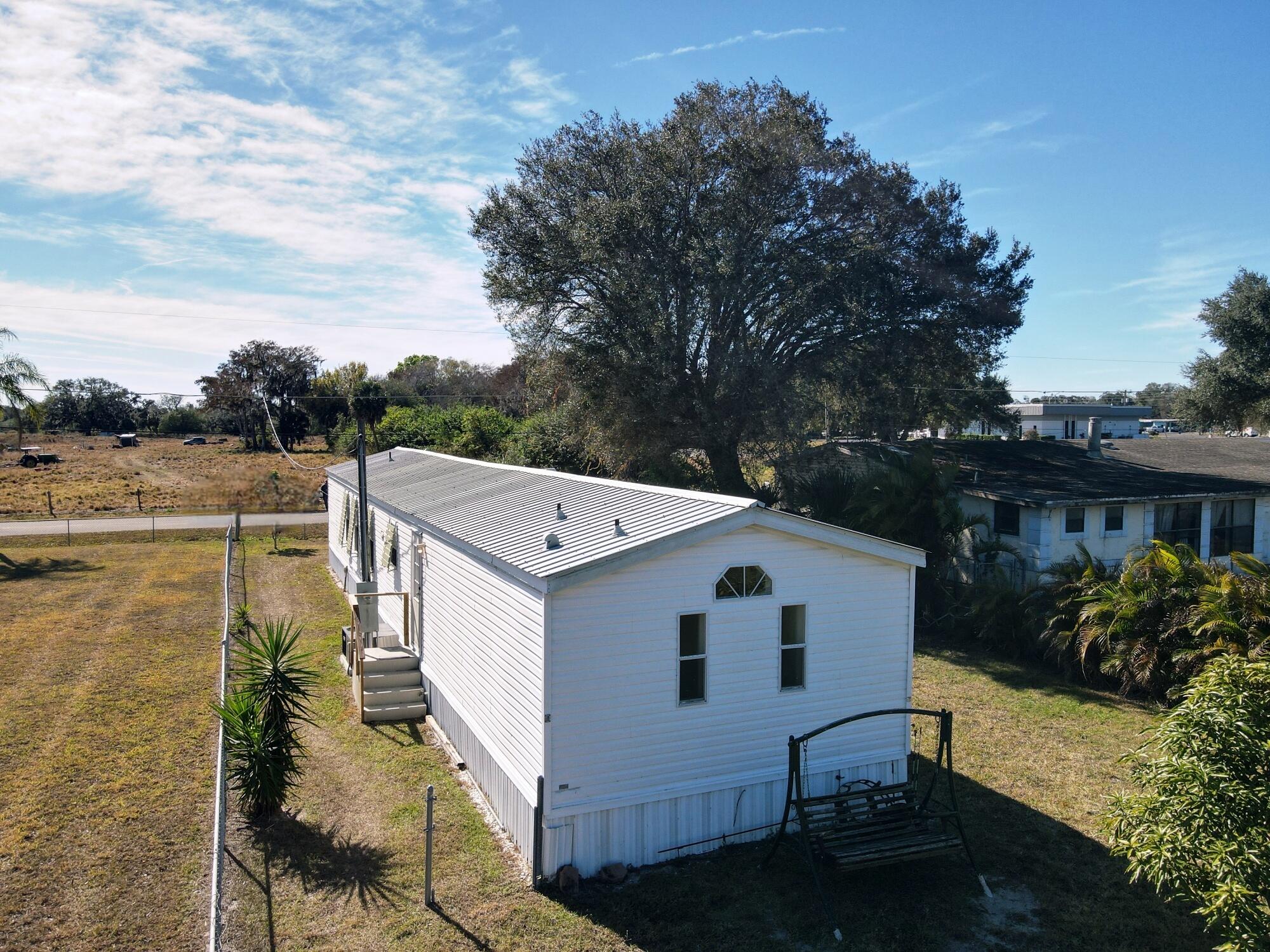 209 Southeast 8th Street Okeechobee, FL 34974 - Photo 3 of 35 dji_fly_20260119_113000_914_176892190280