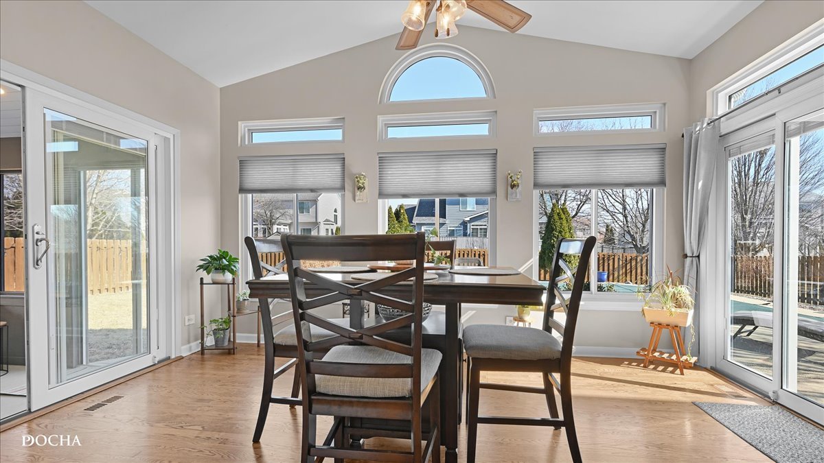 420 Raintree Drive Oswego, IL 60543 - Photo 13 of 51 a dining room with furniture and window