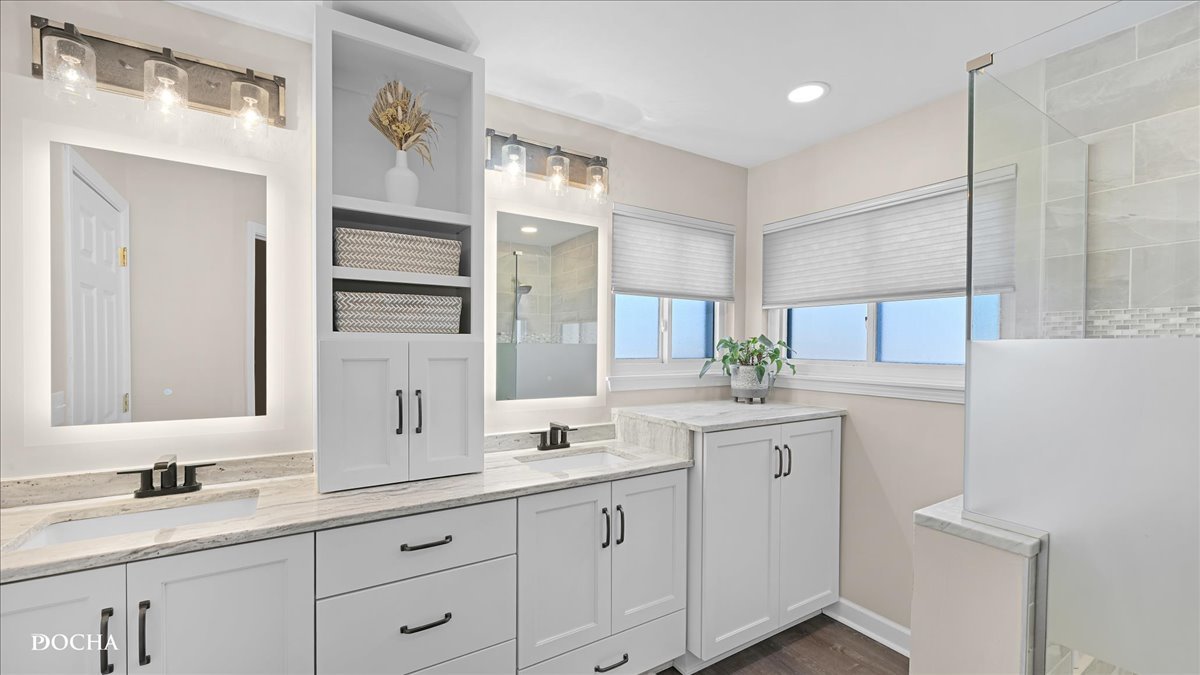 420 Raintree Drive Oswego, IL 60543 - Photo 25 of 51 a bathroom with a double vanity sink and mirror