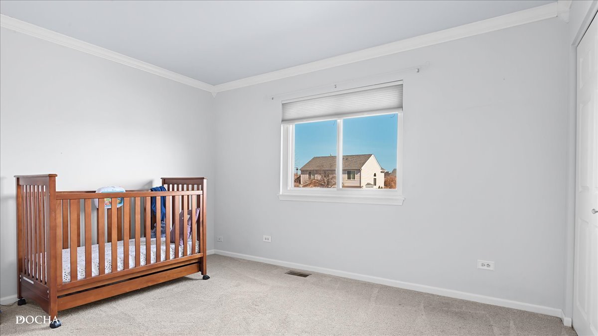 420 Raintree Drive Oswego, IL 60543 - Photo 33 of 51 an empty room with a window