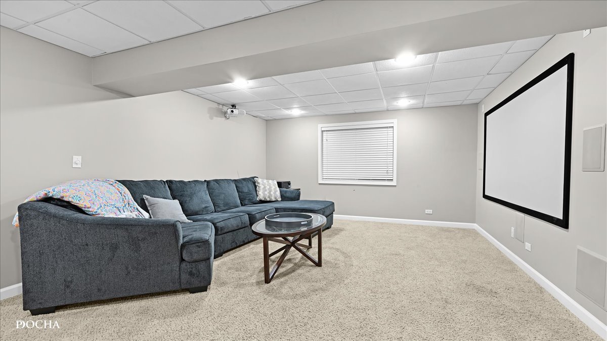 420 Raintree Drive Oswego, IL 60543 - Photo 40 of 51 a living room with furniture and a window
